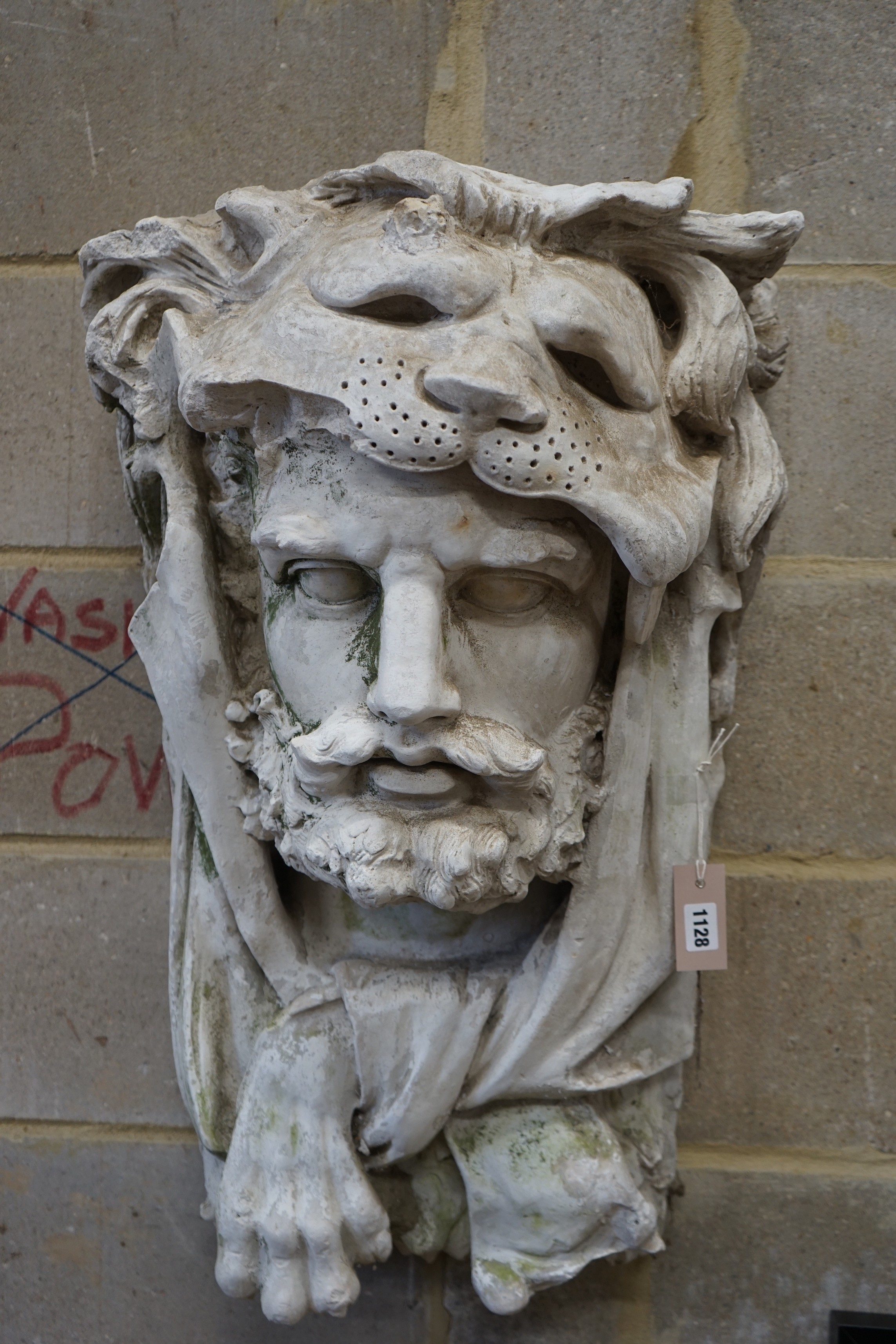 A cast plaster wall mask of Hercules, width 48cm, height 77cm